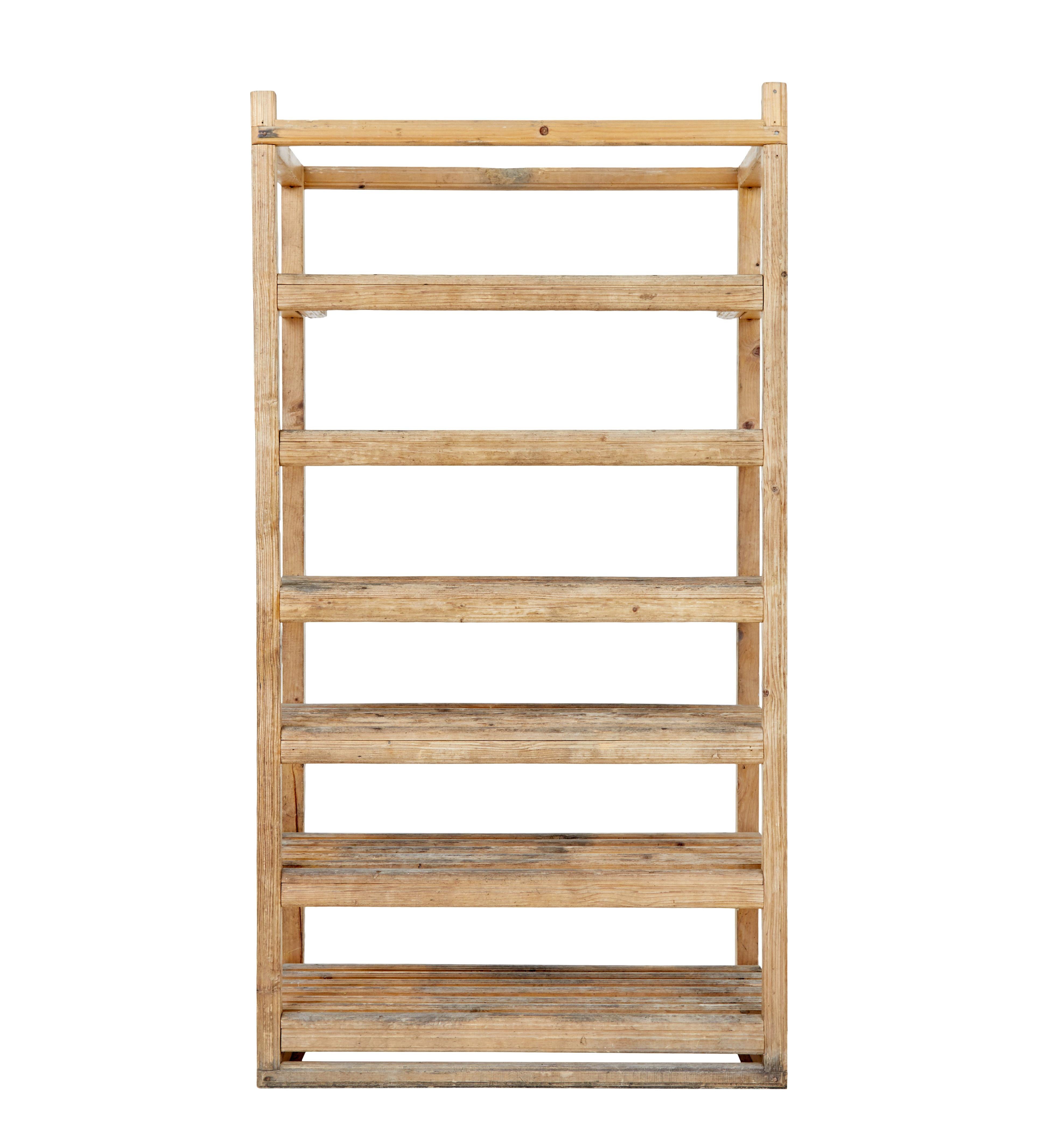 Early 20th century rustic pine storage rack circa 1920.

Rustic made Swedish pine rack, which was likely to have been made for use in a garden room, for cultivation and storage.

Basic joinery used with a hand nailed frame, this could be made