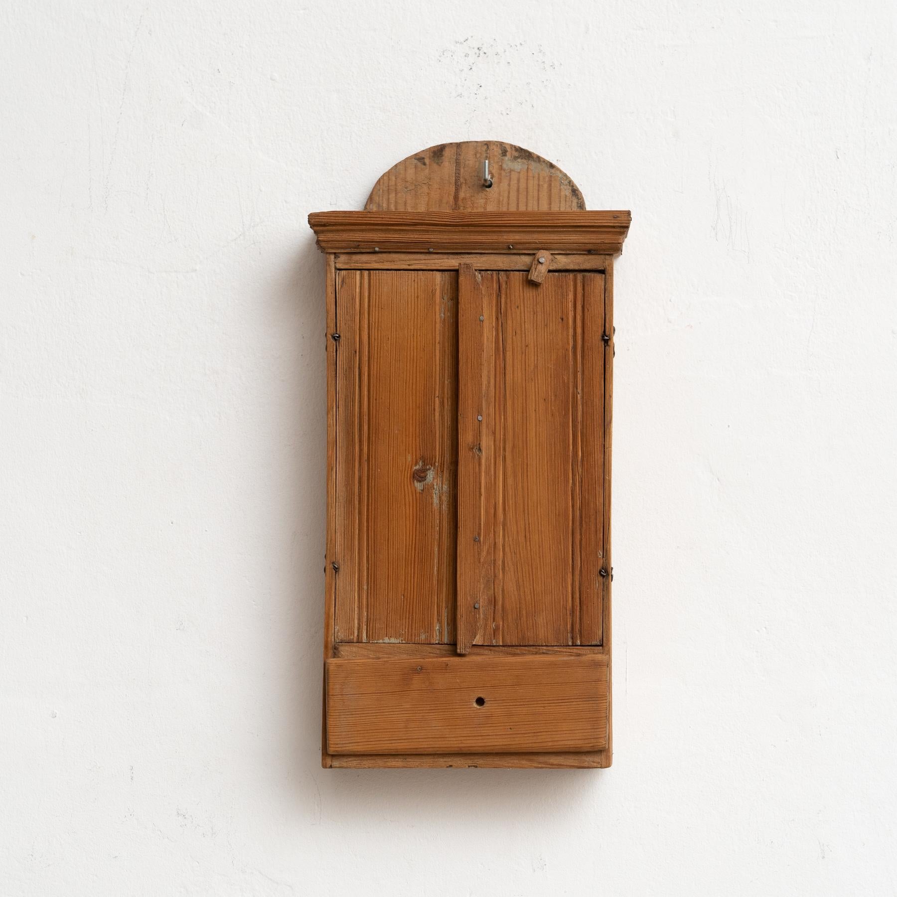 Early 20th Century Rustic Wood Small Wall Cabinet

By unknown manufacturer from France

In original condition, with minor wear consistent of age and use, preserving a beautiful patina.