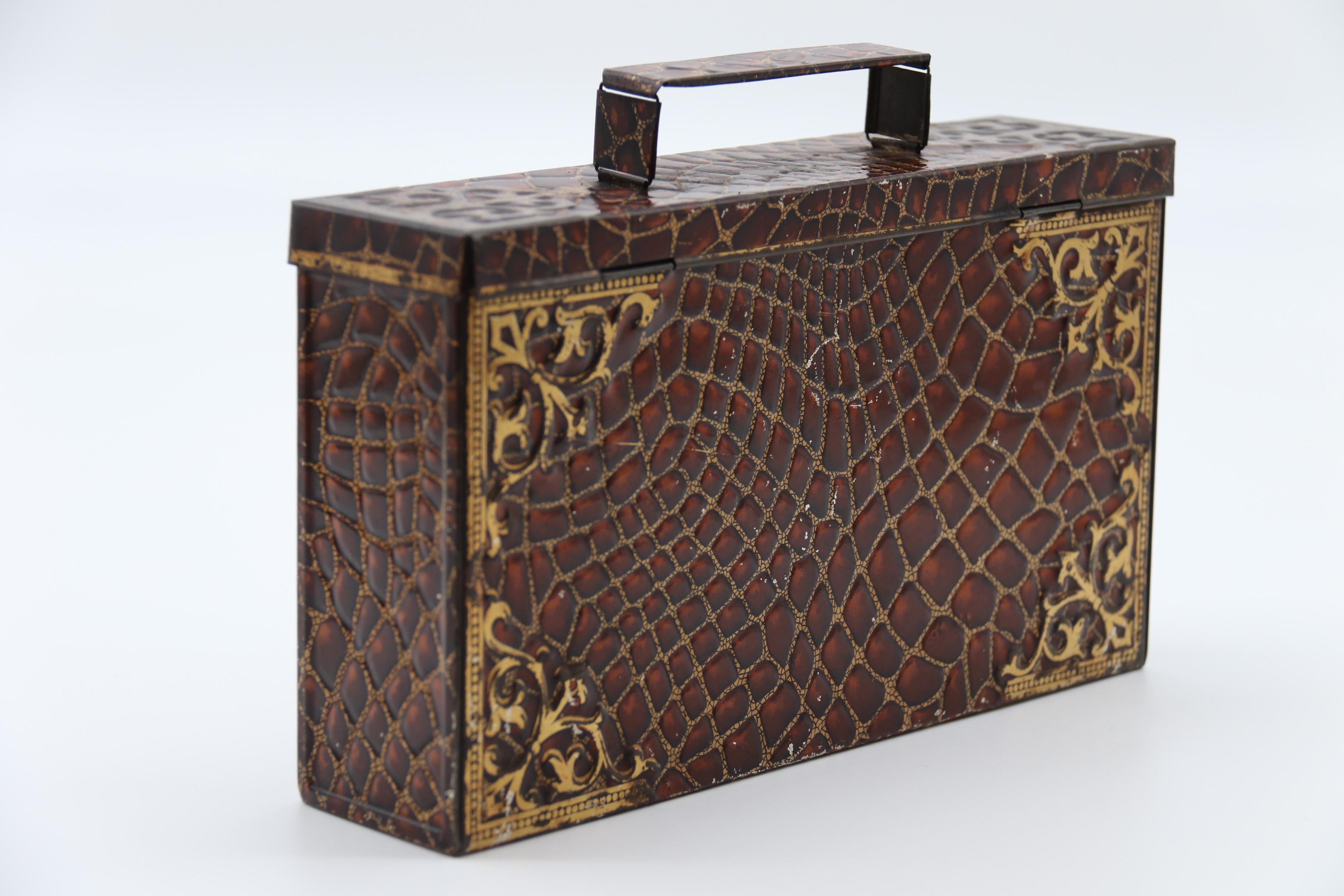 Cast Early 20th century satchel form biscuit tin by Peek Frean and Co, English C 1900 For Sale