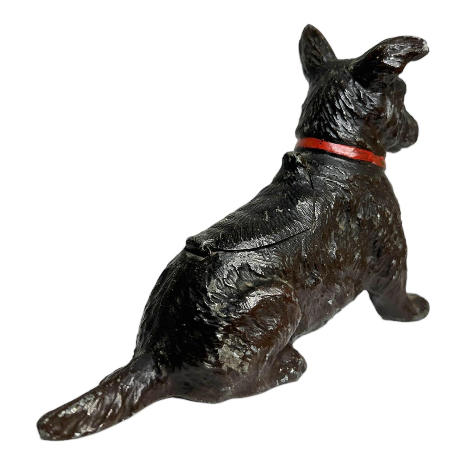 Classic early 1910s Desk Catchall figurine. This polychromed cold painted metal is probably something you need if you’re a Vienna bronze or a dog figure collector. Also nice as a gift for a mom or dad of a Scotty dog. Found at an estate sale in