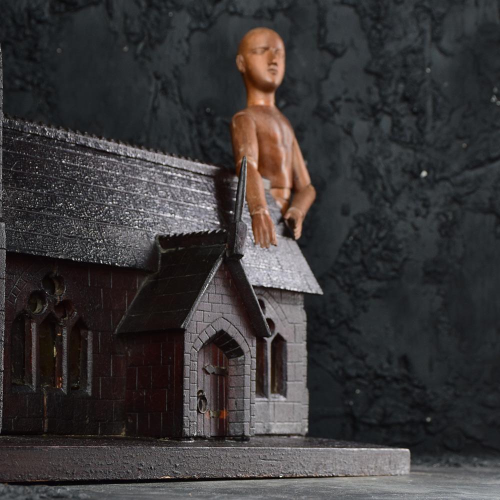 Early 20th century scratch built Church model

We share what we love, and we love this scratch-built pine model of a church. Hand carved detail with glass windows, and a wind-up clock in the tower. The surface has aged naturally with a lovely,