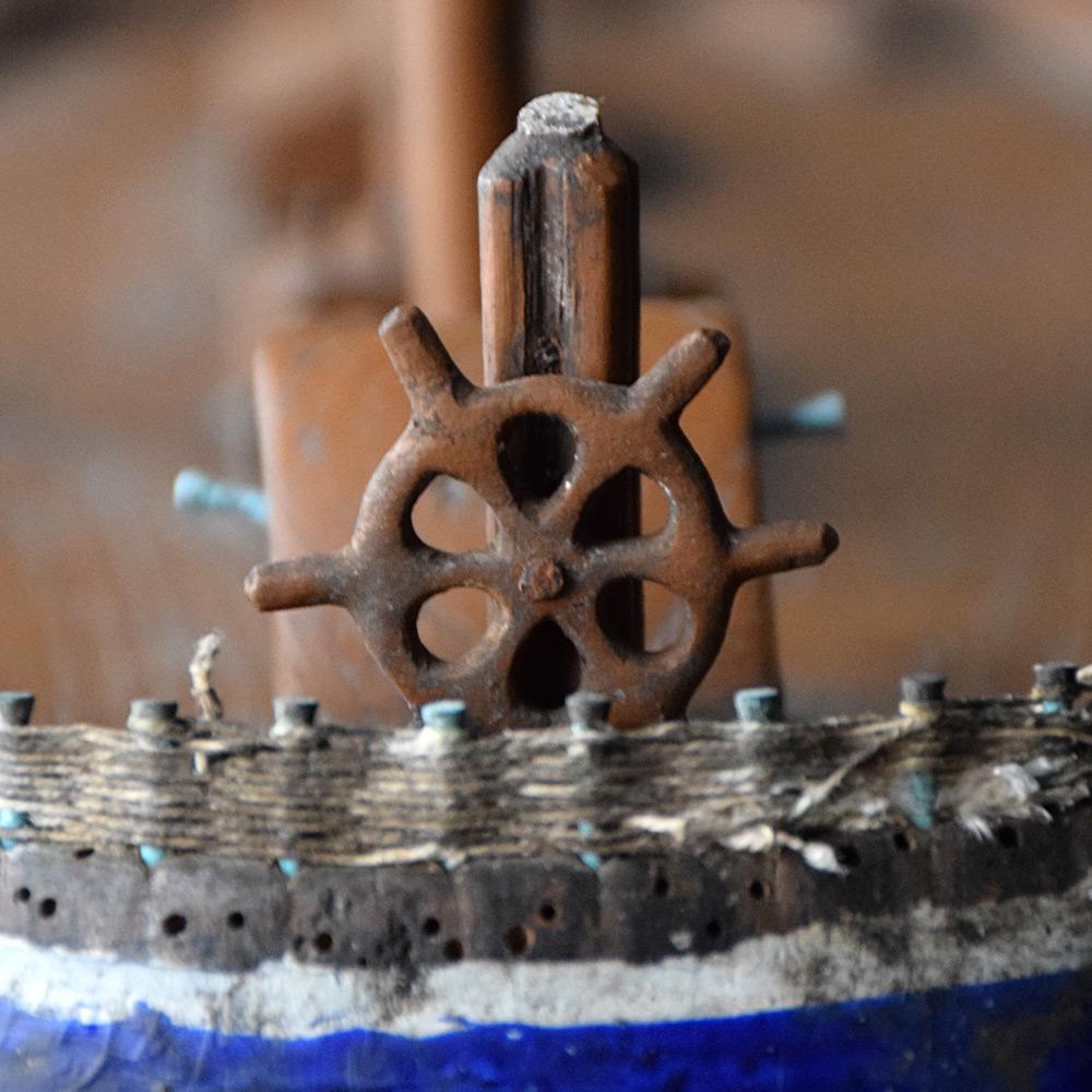 Early 20th century scratch built Folk Art boat model

We are proud to offer a delightful early 20th century scratch built Folk Art French boat model. Hand crafted from sectioned wood and detailing a deck, worn cotton thread sails and lovely bulbus