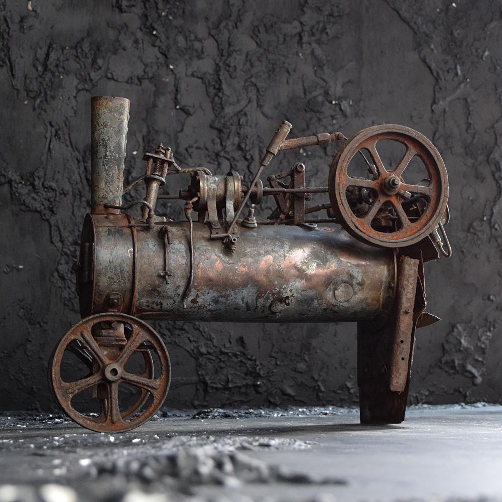 Early-20th century Scratch built folk-art steam locomotive model 

A truly delightful example of an early 20th century scratch built folk-art steam locomotive model. Made from found objects displaying a sculptural and even artistic form. Made from