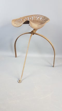 Early 20th Century Sculptural Iron Howard Tractor Seat on Original Base