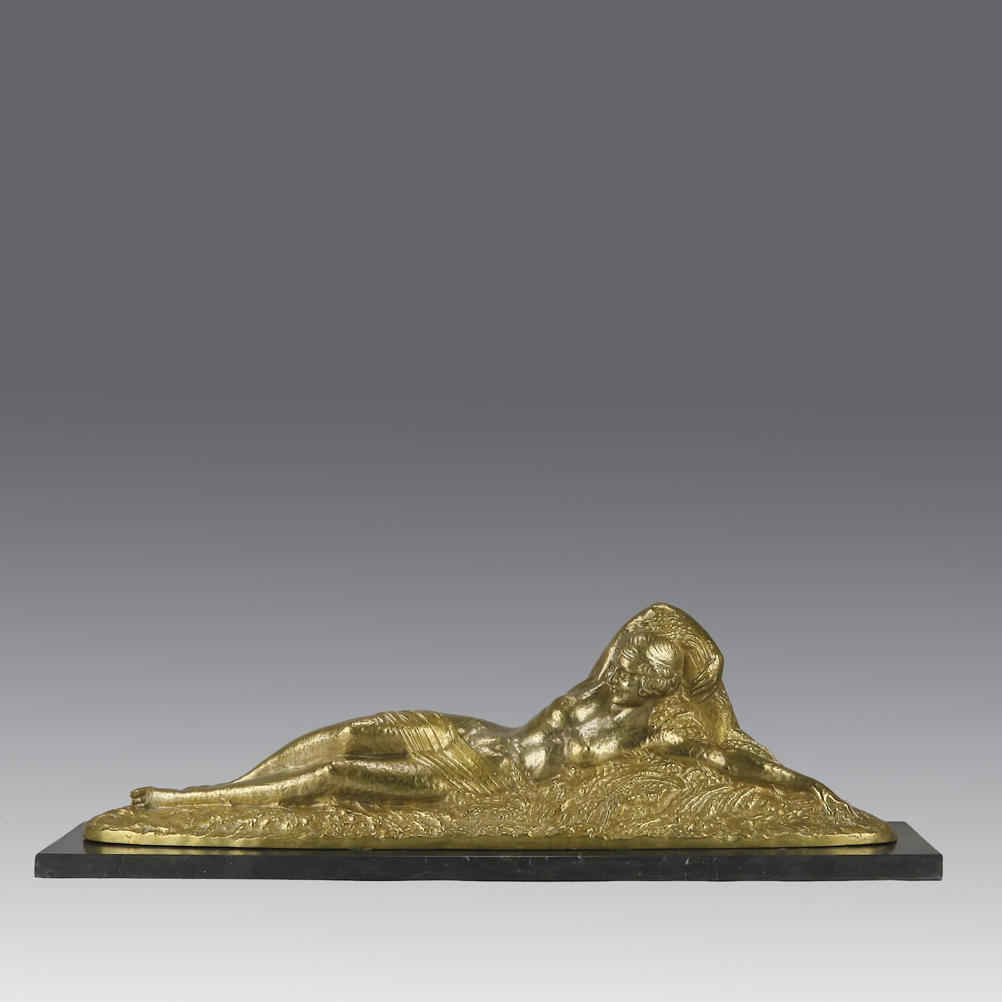 A fabulous Art Deco cold painted gilt and silver bronze figure of a beautiful young woman reclining on a bed of wheat sheaves exhibiting rich colour and very fine hand chased surface detail, raised on a black marble base and signed D H