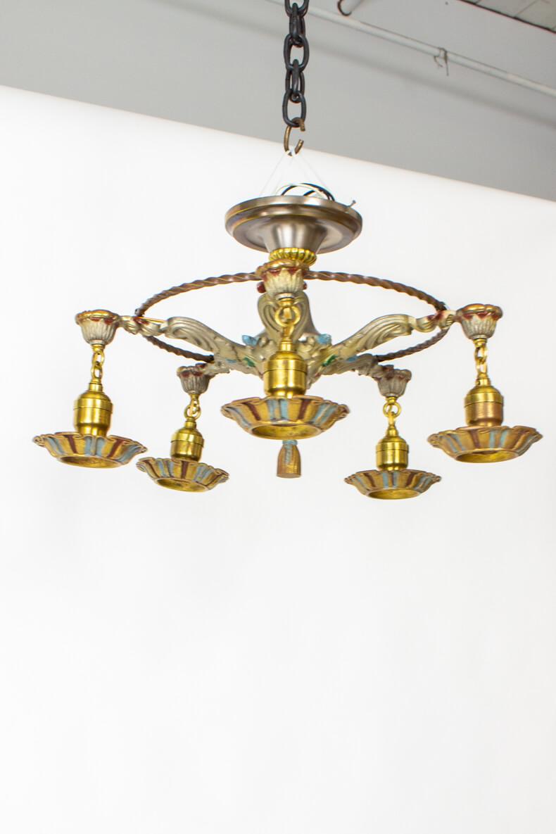 Art Deco Fixture from the 1920’s. Mixed metals with brass, nickel and painted finishes in blue, green, gold and silver. Five lights hang from a central ring. Sits close to the ceiling, and can be used as a chandelier in spaces with low ceilings. Use