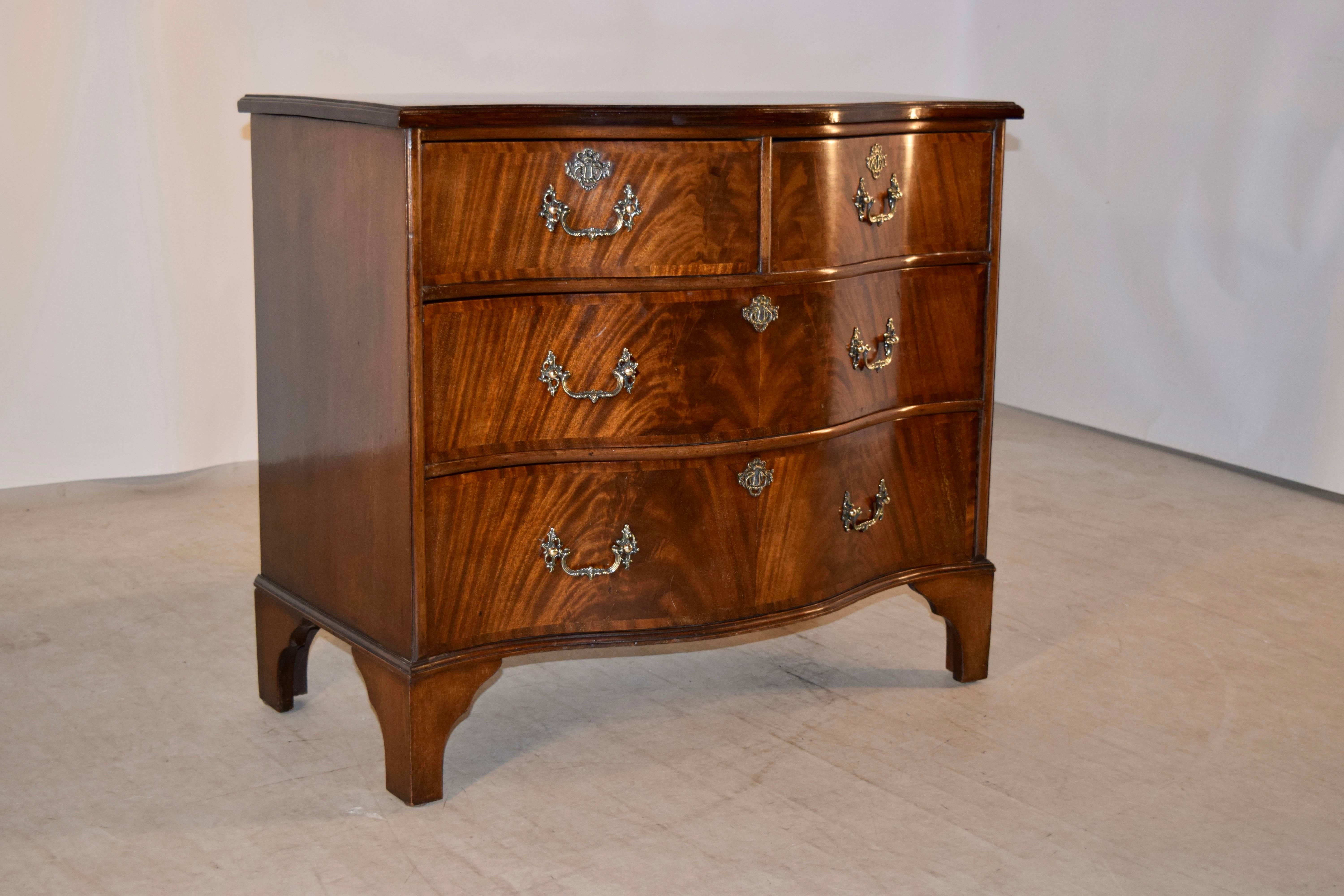 English Early 20th Century Serpentine Chest of Drawers
