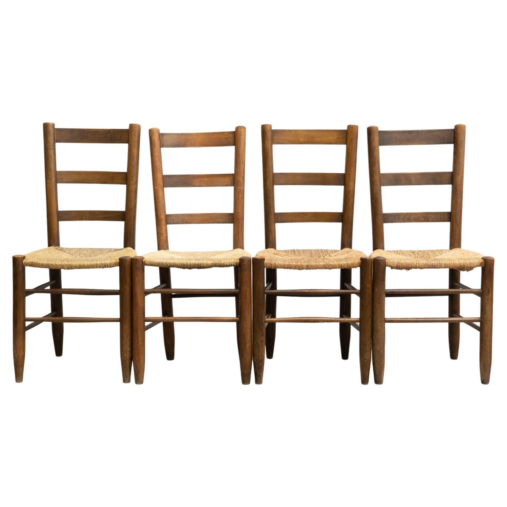 Early 20th Century Set of Four Rattan and Wood Chairs For Sale