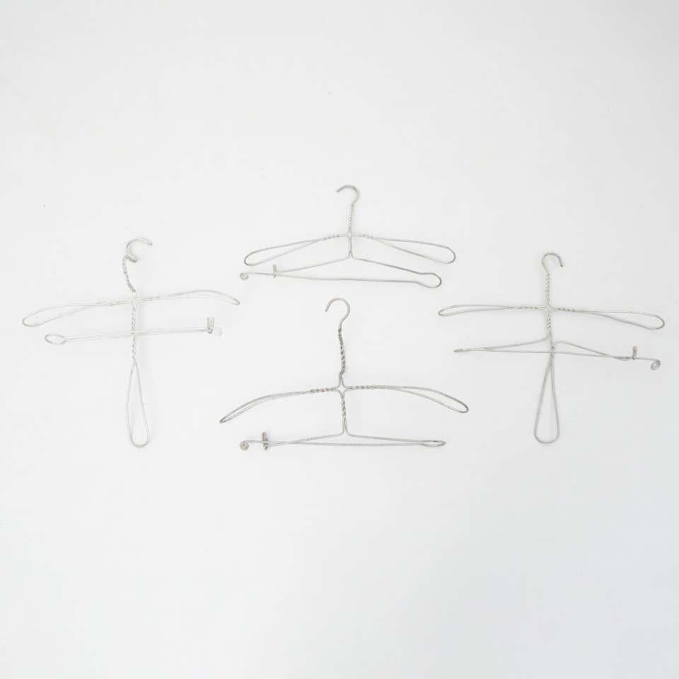 Mid-Century Modern Early 20th Century Set of Four Sculptural Metal Hangers For Sale