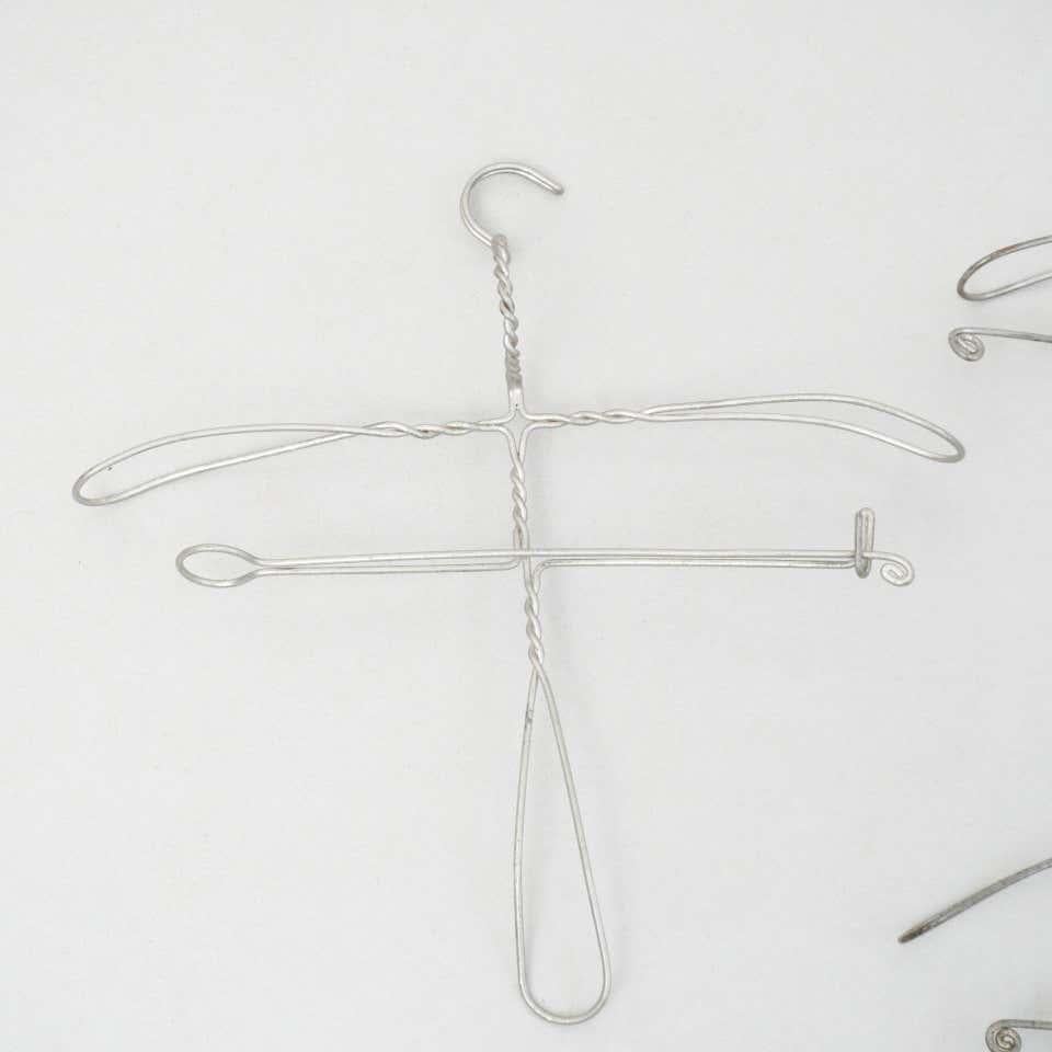 French Early 20th Century Set of Four Sculptural Metal Hangers For Sale