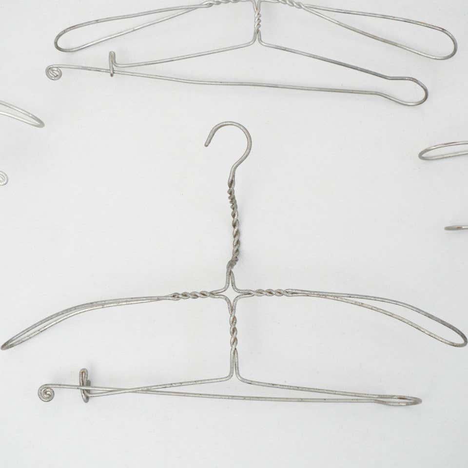 Early 20th Century Set of Four Sculptural Metal Hangers In Good Condition For Sale In Barcelona, Barcelona