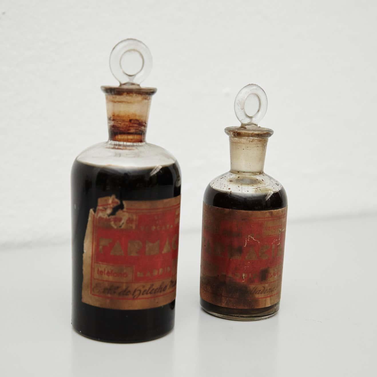Mid-Century Modern Early 20th Century Set of Two Antique Glass Apothecary Bottles For Sale