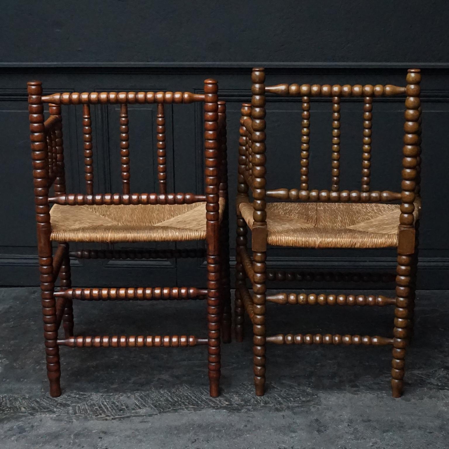 Stained Early 20th Century Set of Two Dutch Turned Beech Bobbin Rush Matted Armchairs
