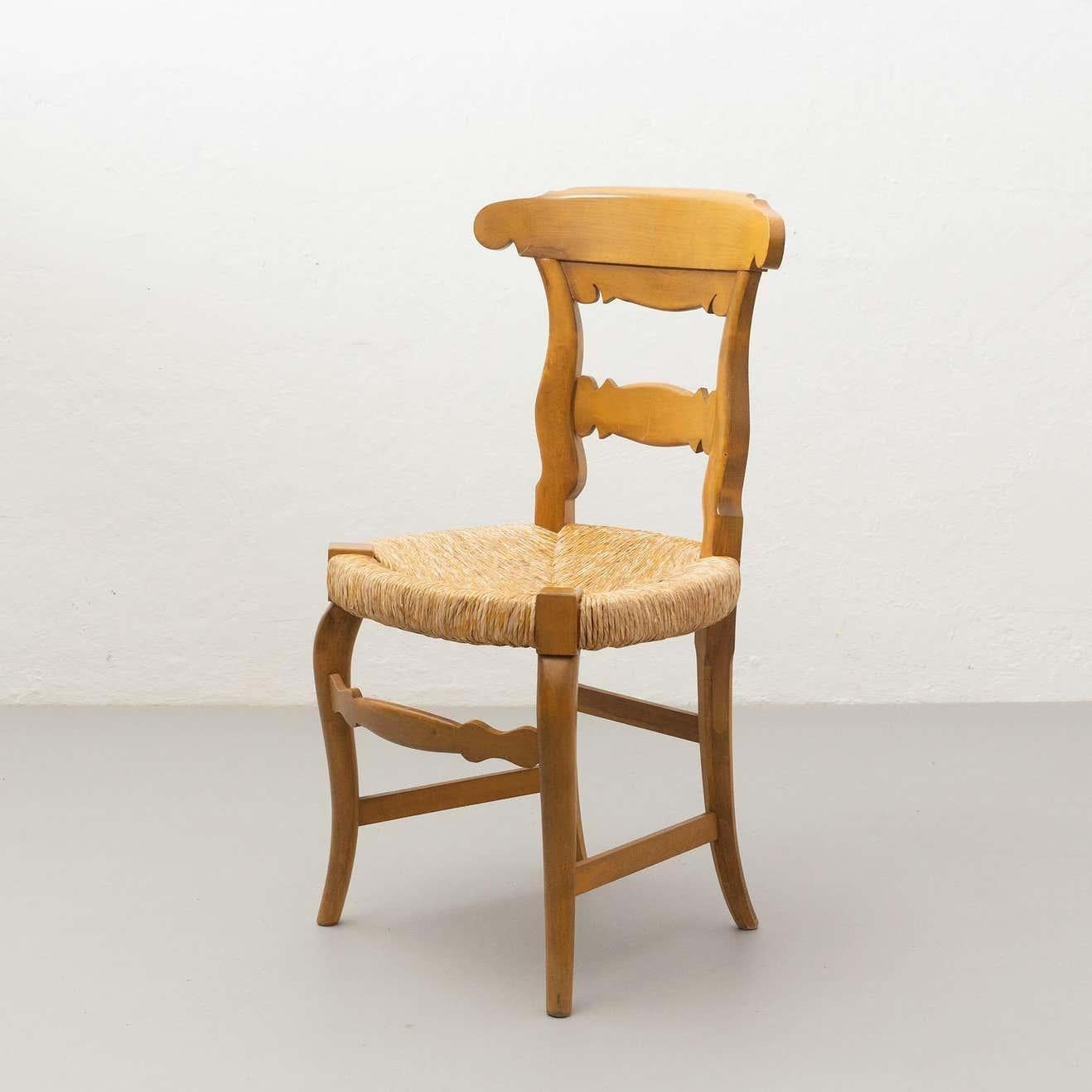 Juego de dos sillas provinciales francesas de ratán y madera de principios del siglo XX en Bueno estado para la venta en Barcelona, ES