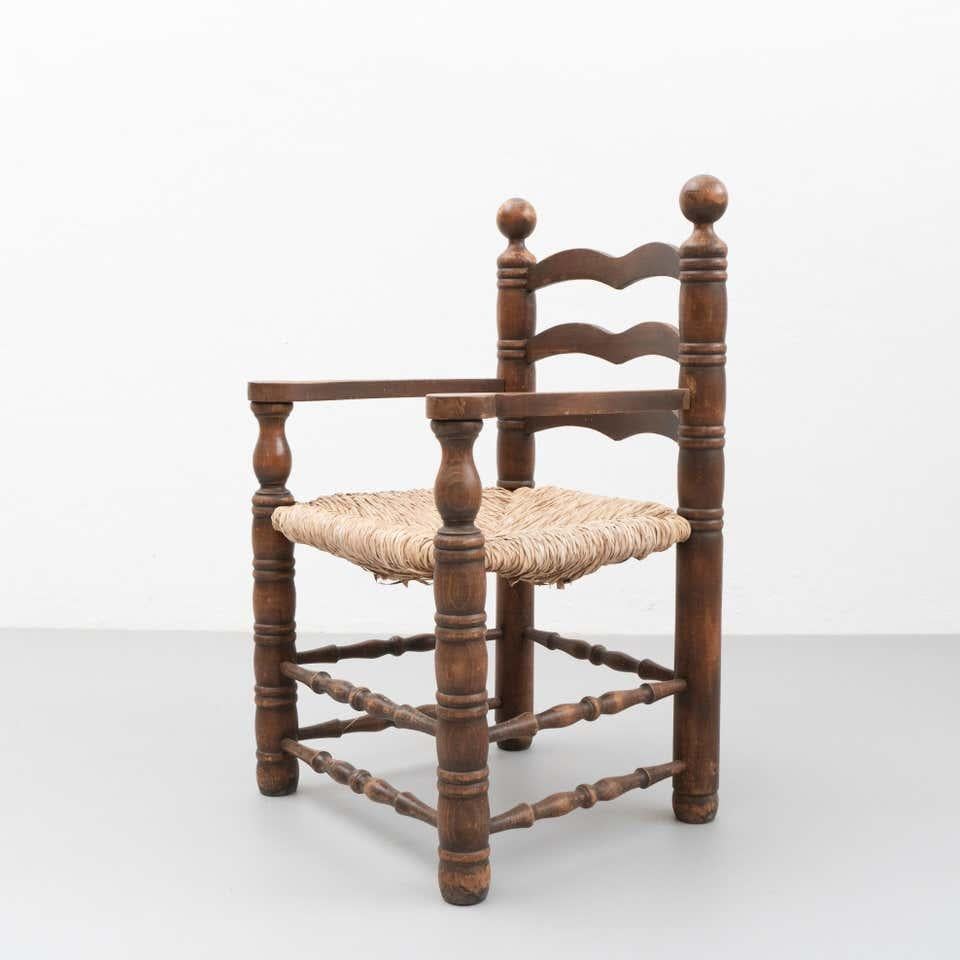 Pair of Early 20th Century Popular Rustic Armchair in Wood and Rattan In Good Condition For Sale In Barcelona, Barcelona