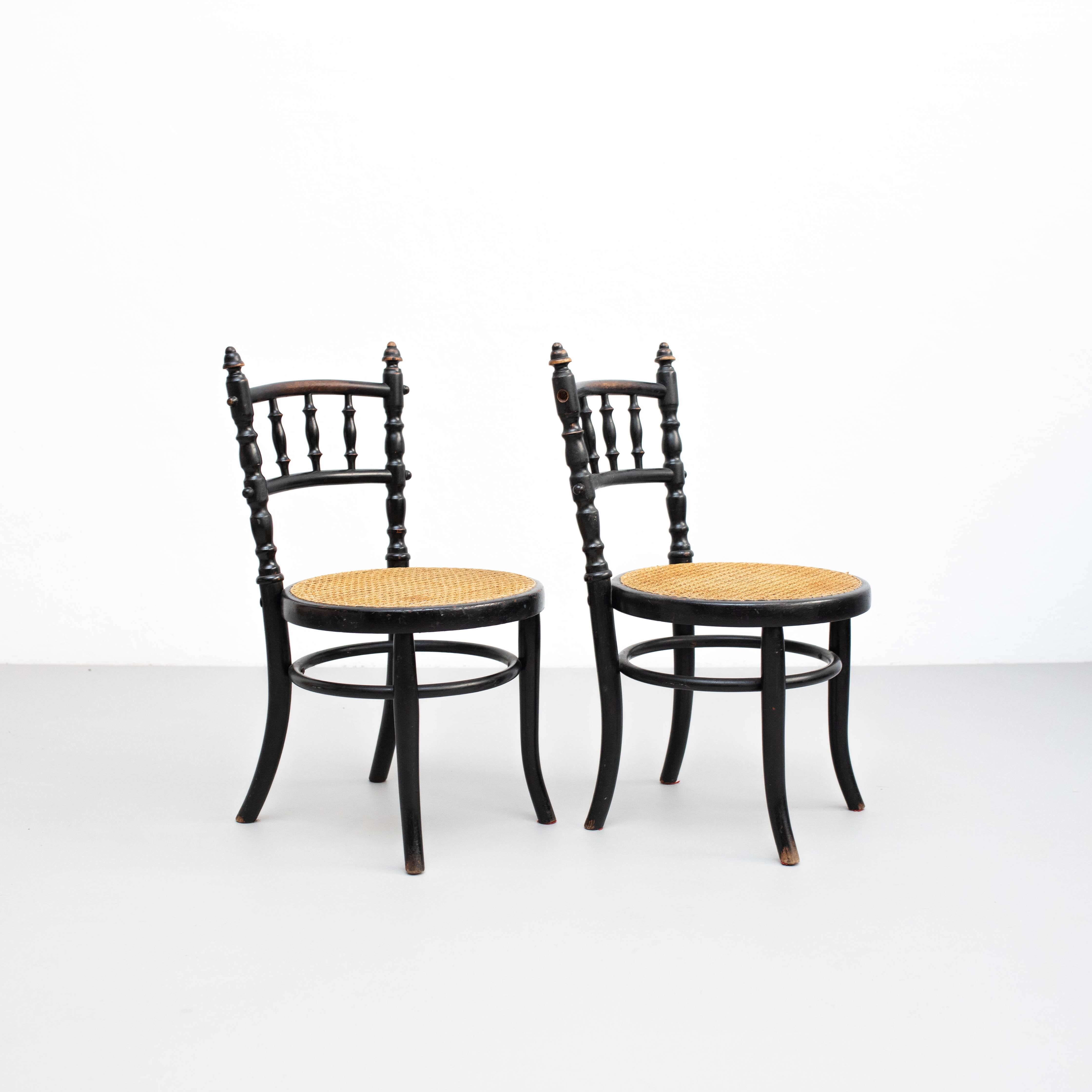 Spanish Early 20th Century Set of Two Rattan and Wood Chairs For Sale