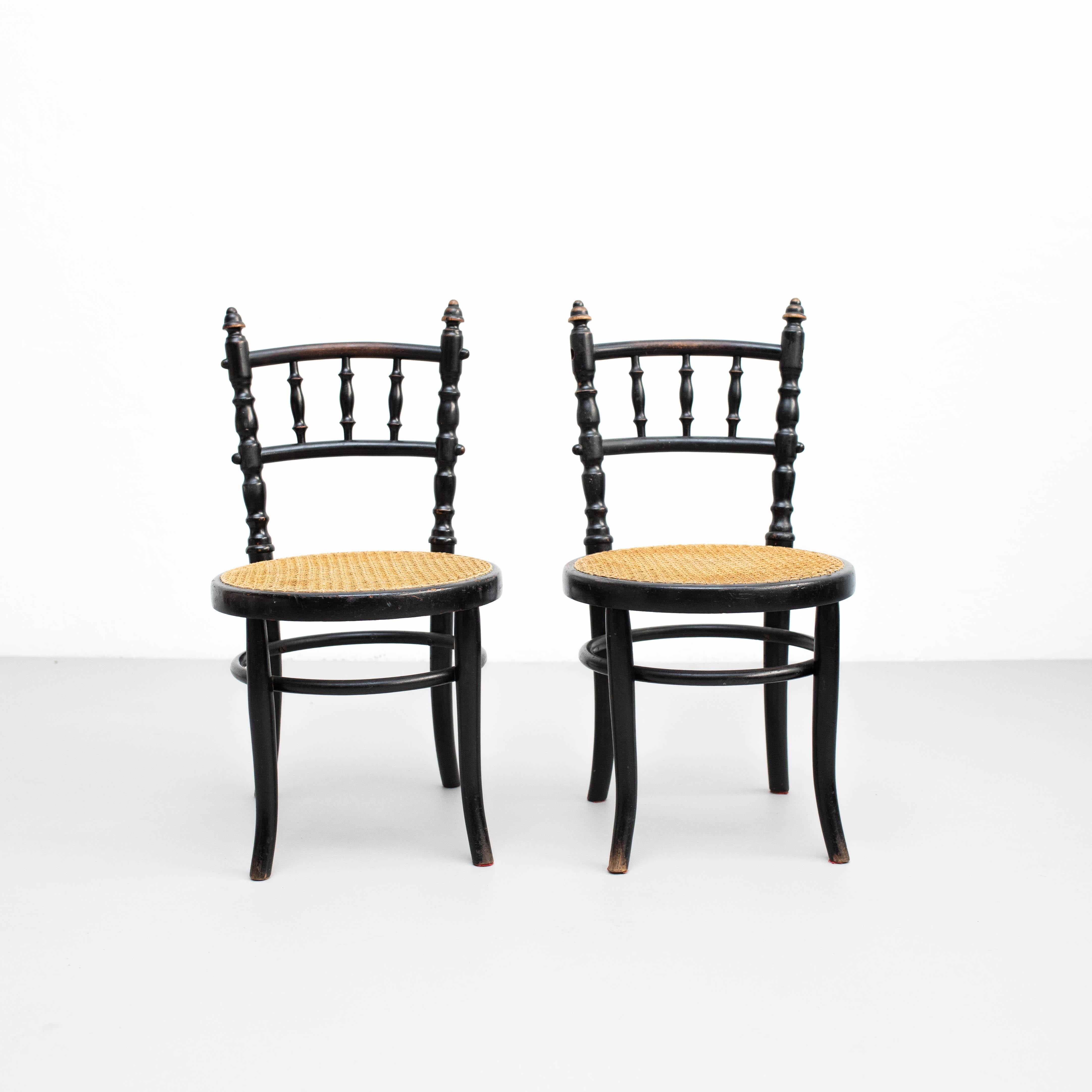 Spagnolo Set di due sedie in rattan e Wood dell'inizio del XX secolo in vendita