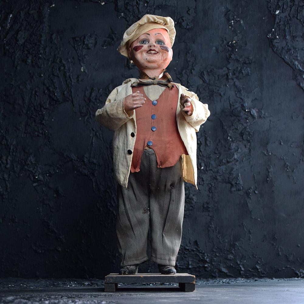 Early 20th century shop advertising automaton clockwork figure 

We share what we love, and we love this unusual clockwork automaton figure of a baker boy. Stood on a wooden plinth (which he can be removed from). This figure is made from wood and