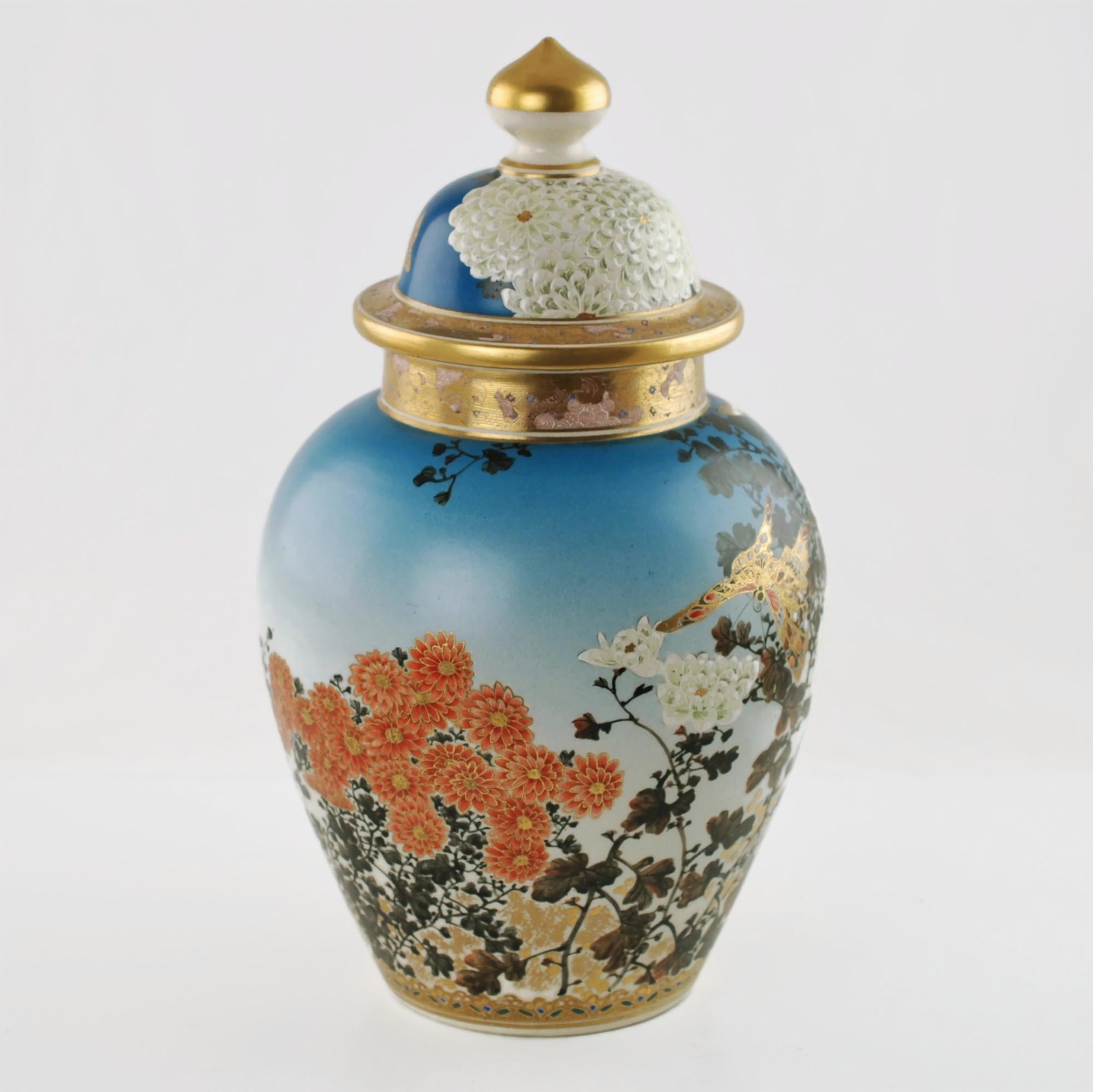 This outstanding late 19th century Japanese Satsuma porcelain covered temple jar has a traditional form with a domed lid. The piece features exquisite hand painted decoration which includes brightly hued flowers and associated foliage along with