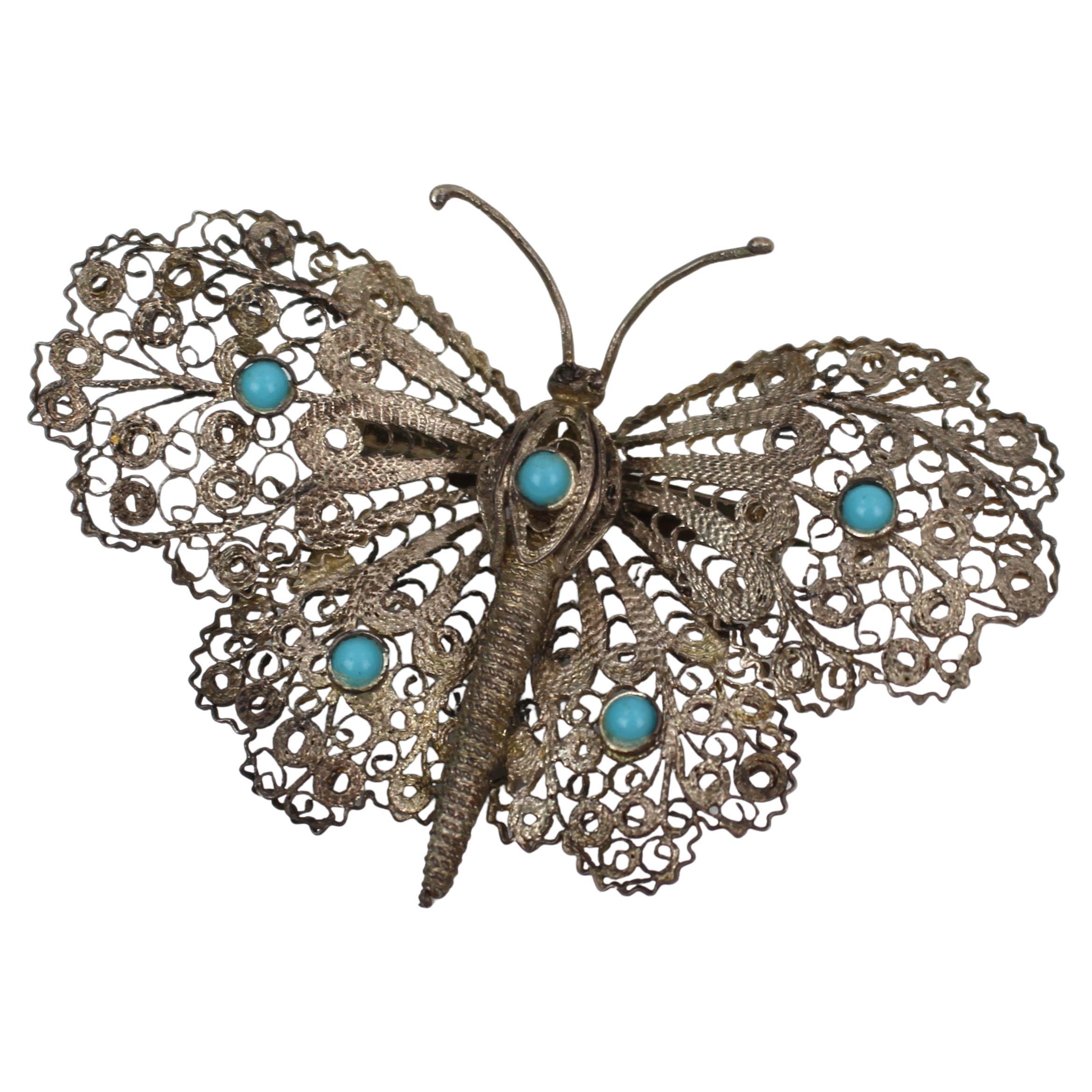 Early 20th Century Silver Filigree Butterfly Brooch with Turquoise Cabochons