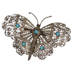 Antique Early 20th Century Silver Filigree Butterfly Brooch with Turquoise Cabochons