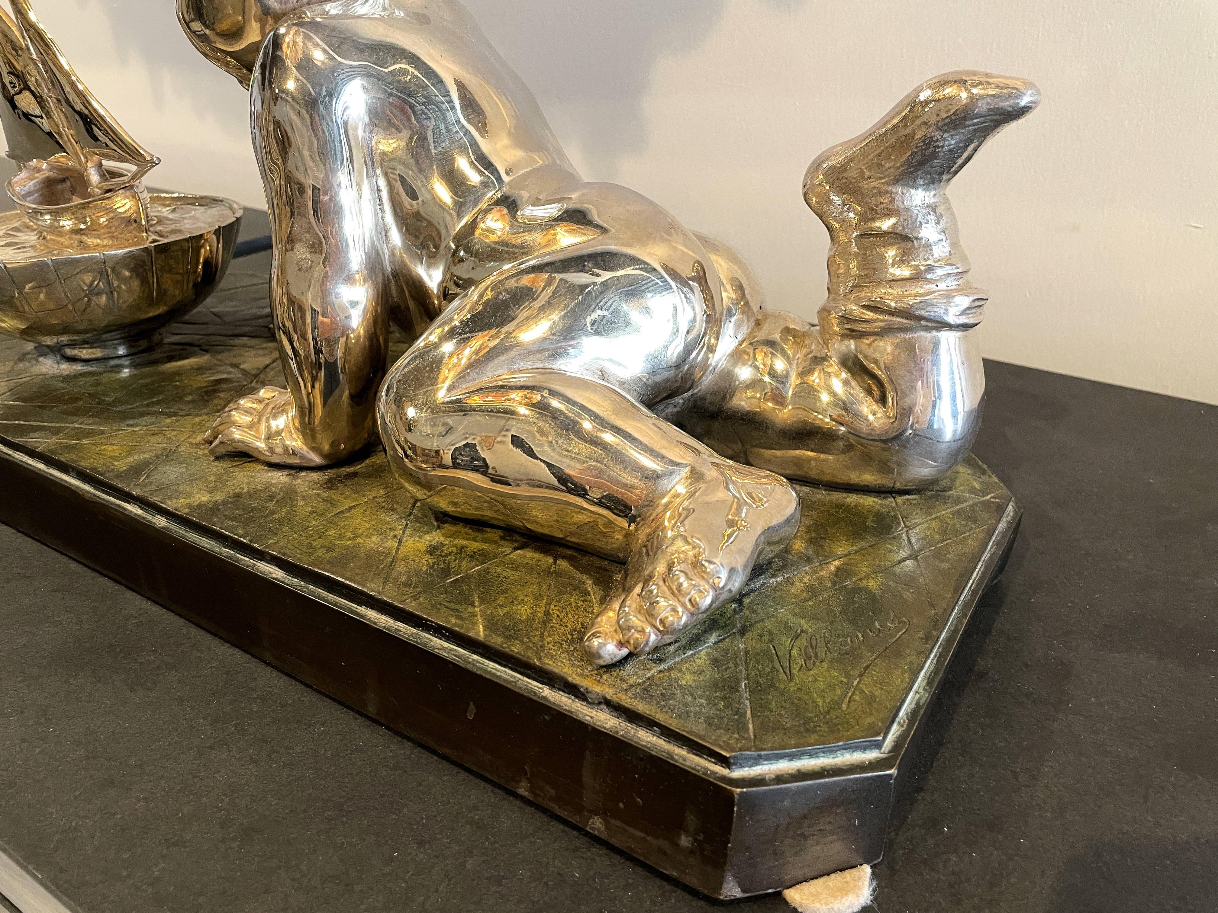 Early 20th Century Silvered Bronze Enfant Jouant Avec Un Bateau In Good Condition For Sale In Miami, FL