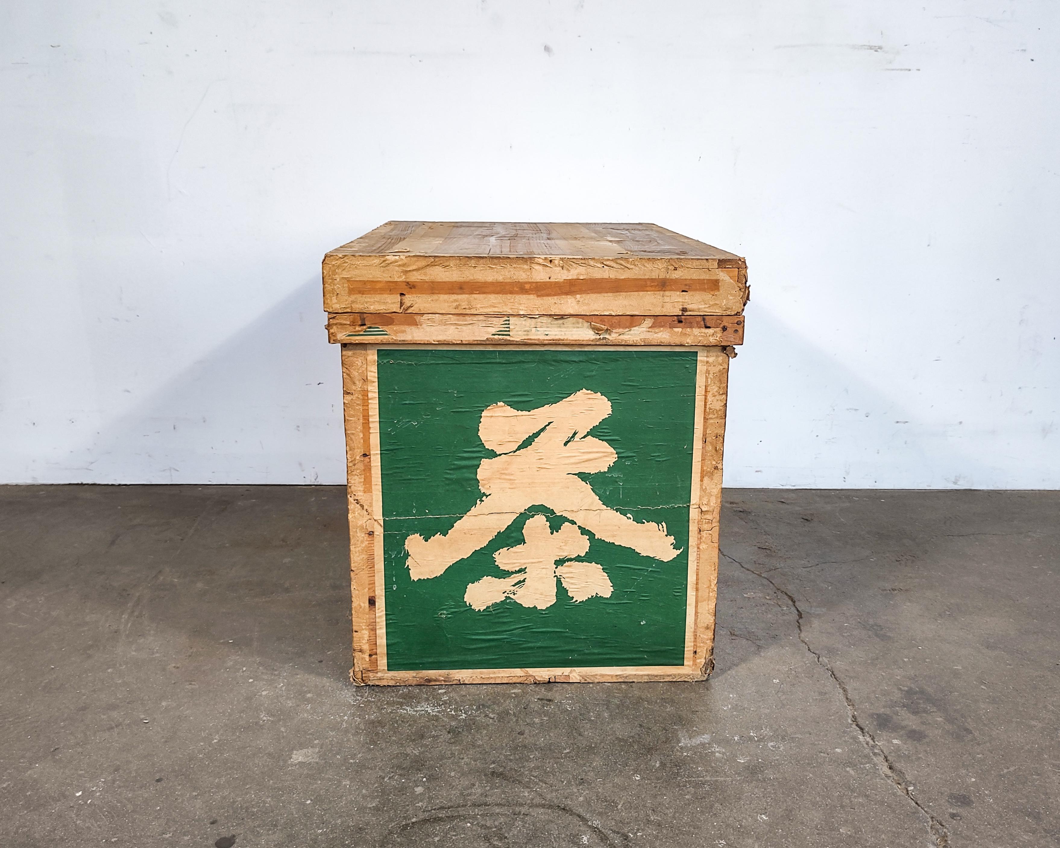 Vintage Japanese cedar wood tea shipping crate circa 1960s. Original graphic and labeling on exterior, interior aluminum lined.
Measures: 17