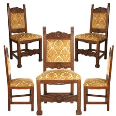Early 20th Century Six Renaissance Chairs, in Solid Walnut Richly Hand Carved