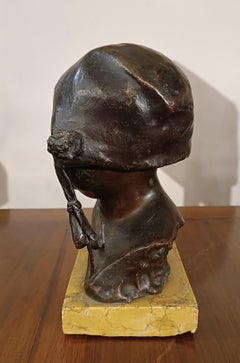 EARLY 20th CENTURY SMALL BRONZE CHILD WITH CAP BY P. PIRAINO