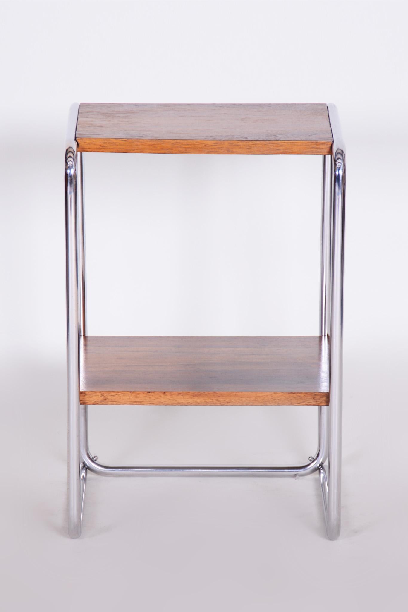 Completely restored small Czech chrome Bauhaus table.
Material: Walnut and chrome-plated steel
Period: 1930-1939
Source: Czechia.