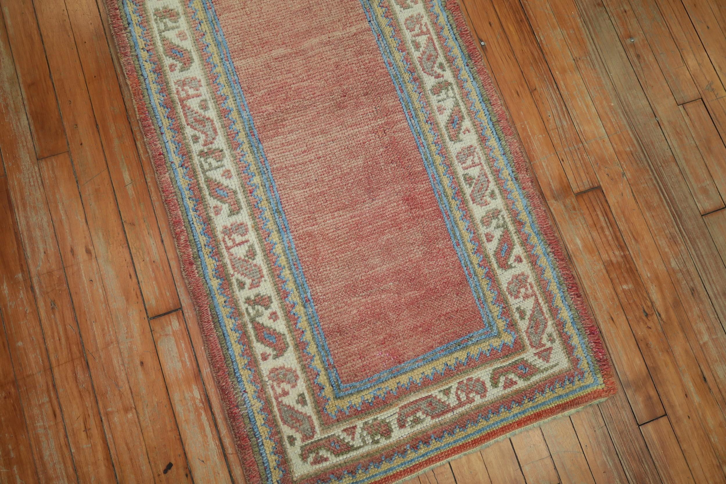 Hand-Woven Early 20th Century Soft Red Antique Turkish Oushak Wool Narrow Runner