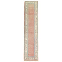 Early 20th Century Soft Red Antique Turkish Oushak Wool Narrow Runner