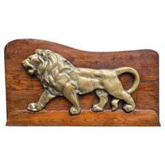 Early 20th Century Solid Bronze Lion Relief on Oak Panel, Europe, circa 1900