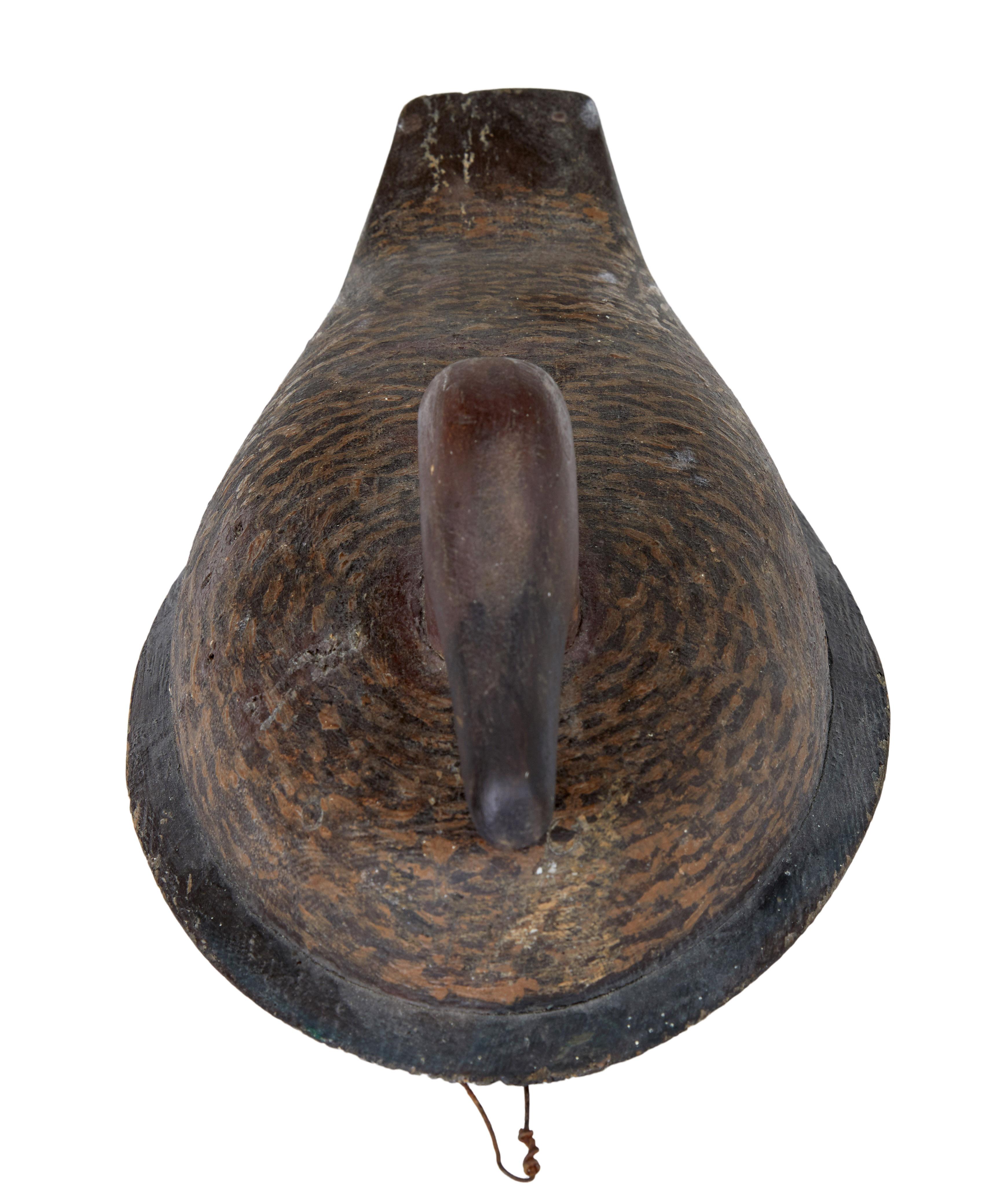 Fine quality piece of scandinavian folk art circa 1900.

Solid pine decoy duck with original hand painted detail. Fitted with wire for mounting on the wall.

Minor losses to painted surface. A fine example.

