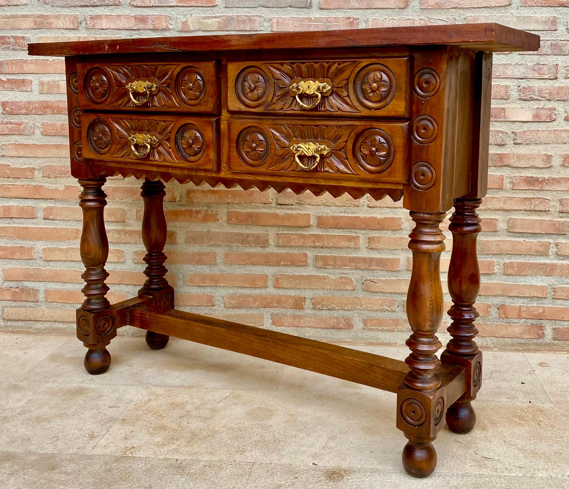 Spanish Colonial Early 20th Century Spanish Carved Console Table with Four Drawers, 1930s For Sale