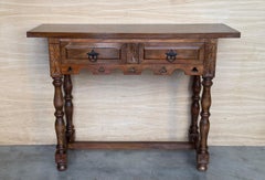 Early 20th Century Spanish Carved Dark Walnut Console Table with Fluted Legs