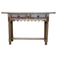 Early 20th Century Spanish Carved Light Walnut Console Table with Fluted Legs Early 20th Century Spanish Carved Light Walnut Console Table with Fluted Legs
