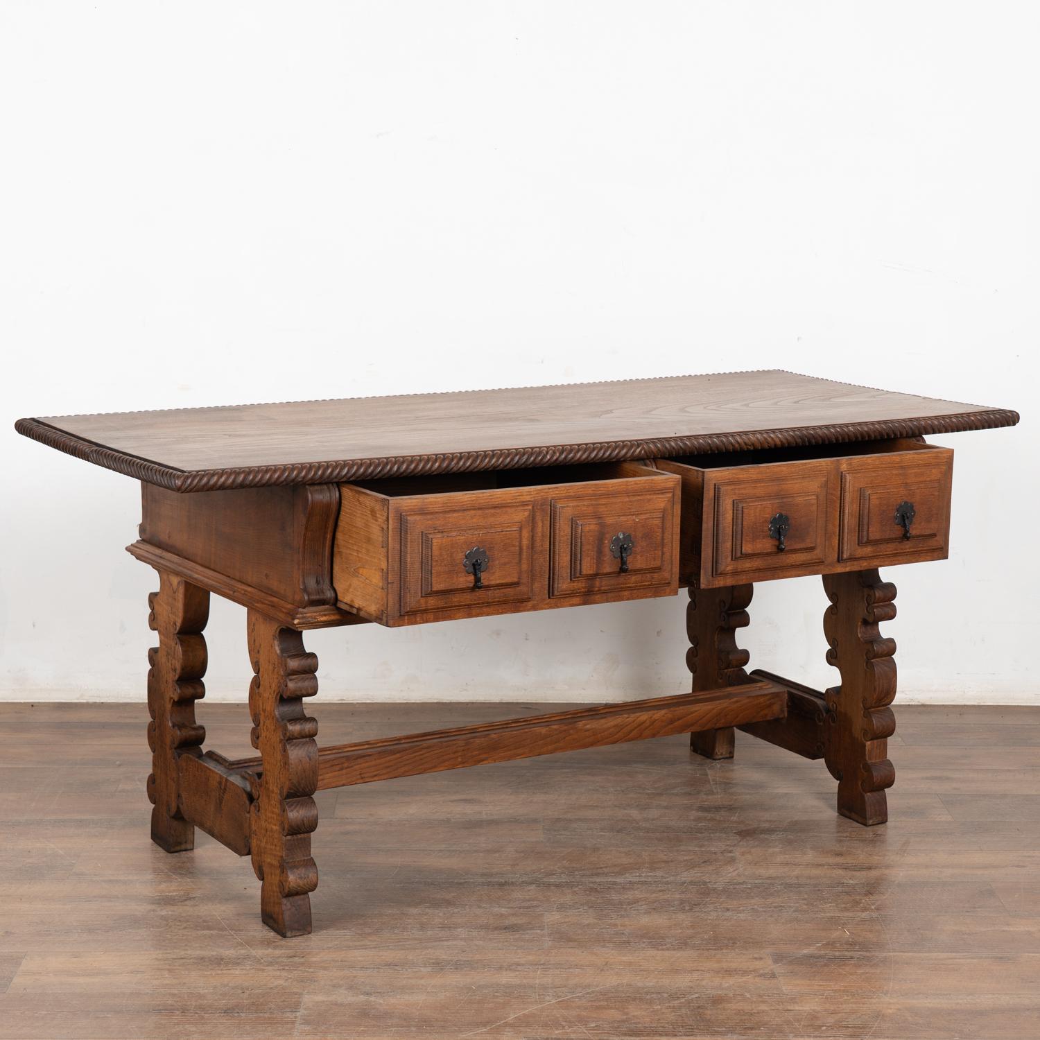 Spanish Colonial Early 20th Century Spanish Carved Oak Console Table with Two Drawers For Sale