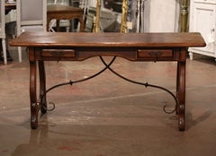 Early 20th Century Spanish Carved Oak Writing Table Desk with Iron Stretcher