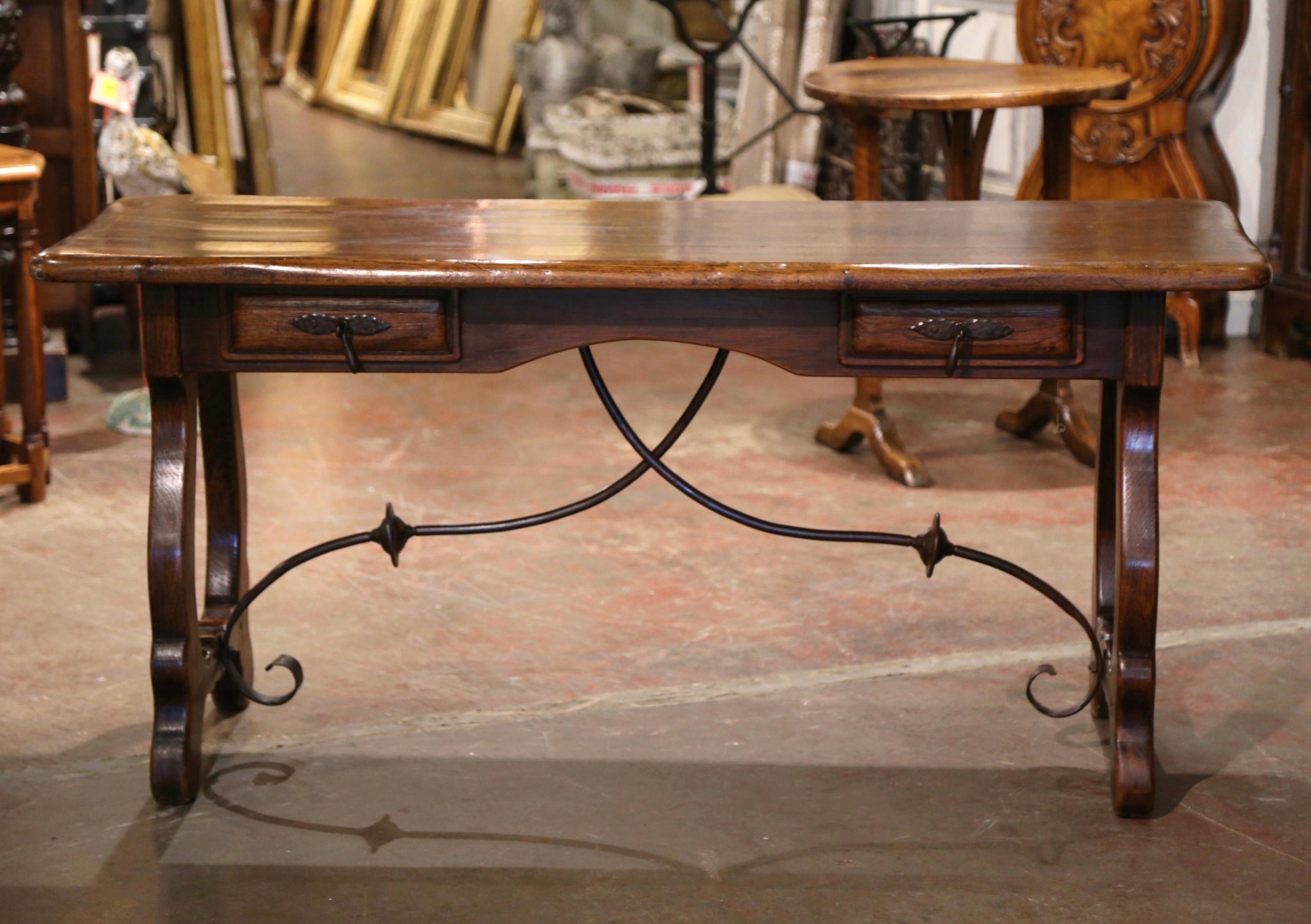 Louis XIII Early 20th Century Spanish Carved Oak Writing Table Desk with Iron Stretcher