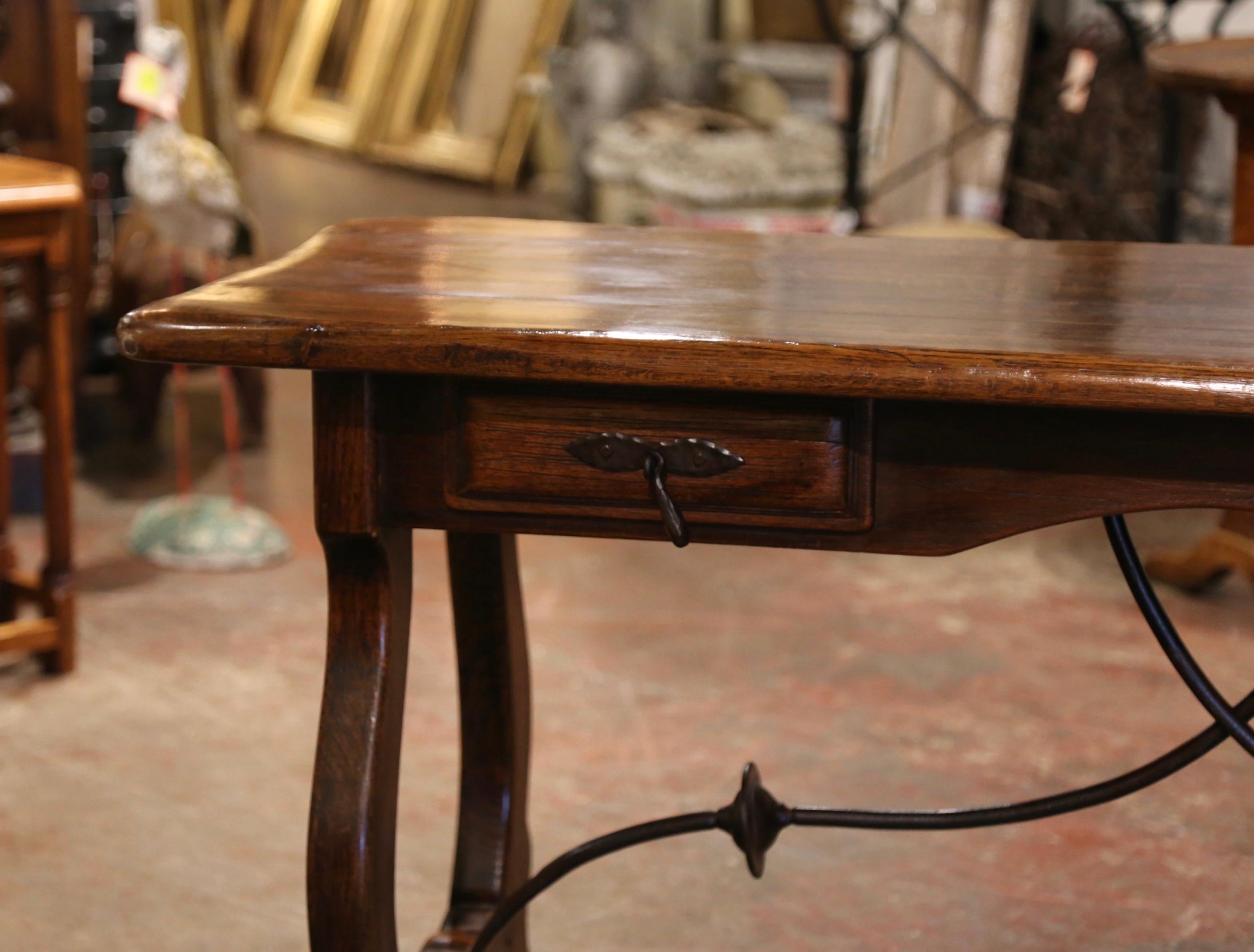 Early 20th Century Spanish Carved Oak Writing Table Desk with Iron Stretcher 1