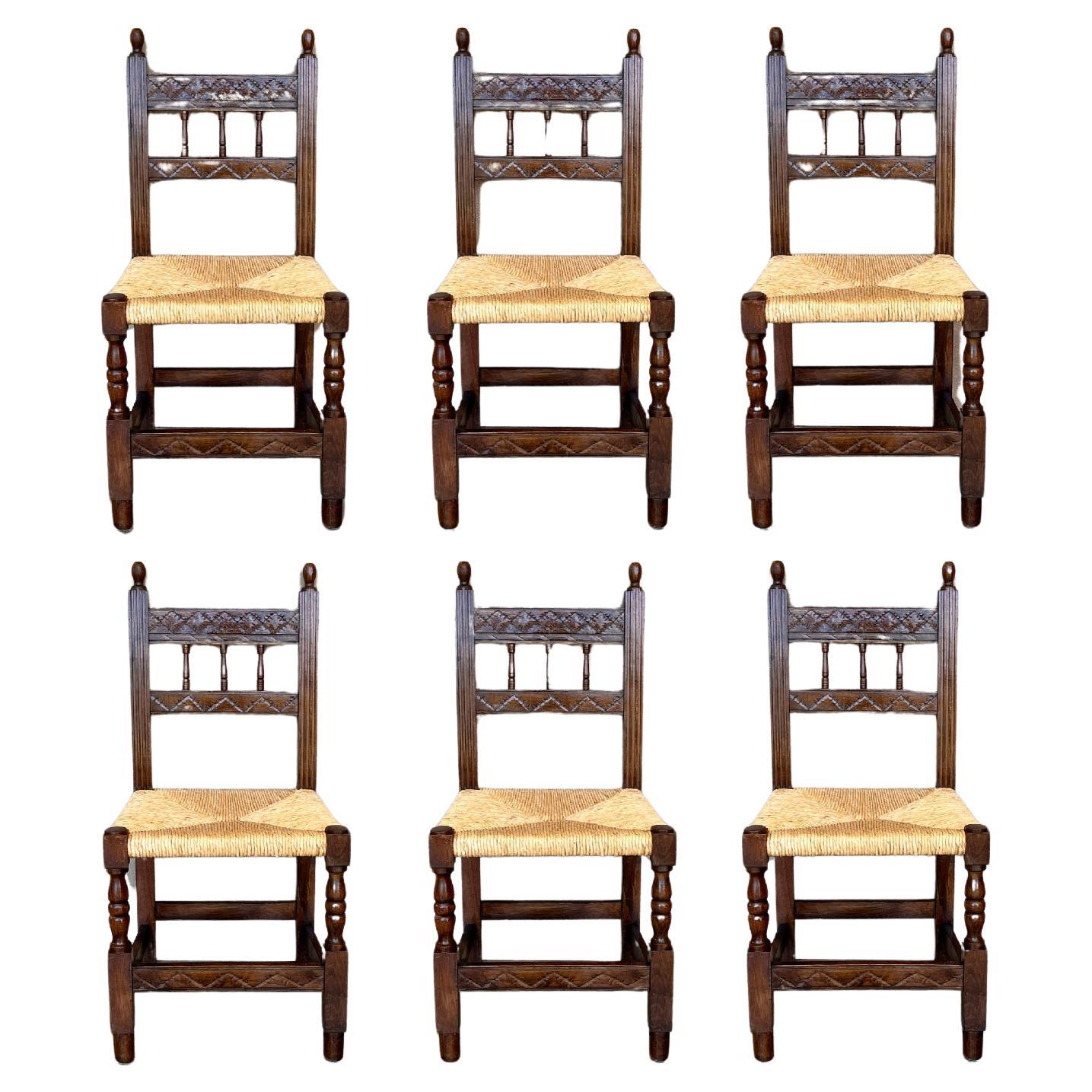 Spanische geschnitzte Esszimmerstühle aus Nussbaumholz des frühen 20. Jahrhunderts, 6er-Set