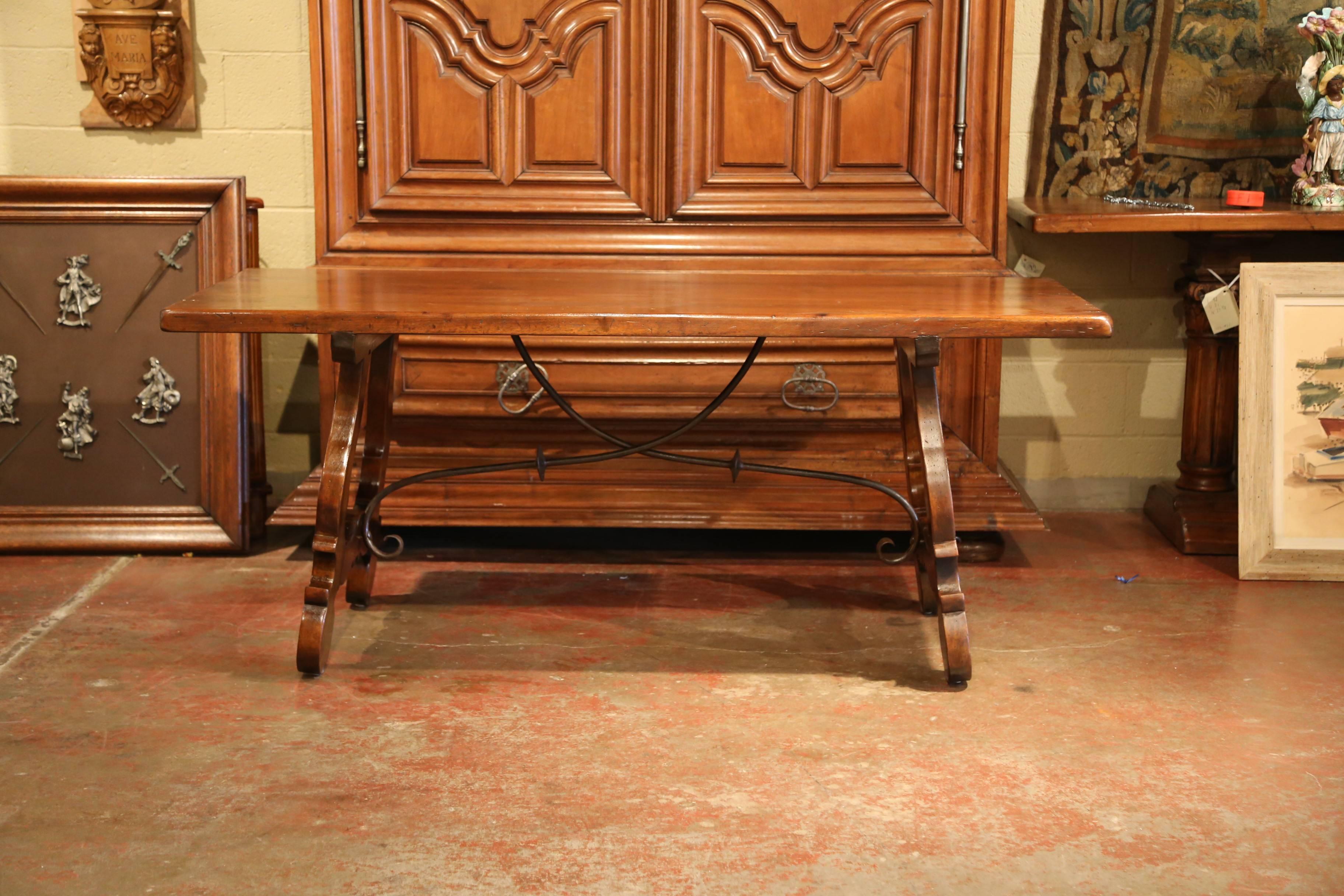Louis XIII Early 20th Century Spanish Carved Walnut Trestle Table and Forged Iron Stretcher
