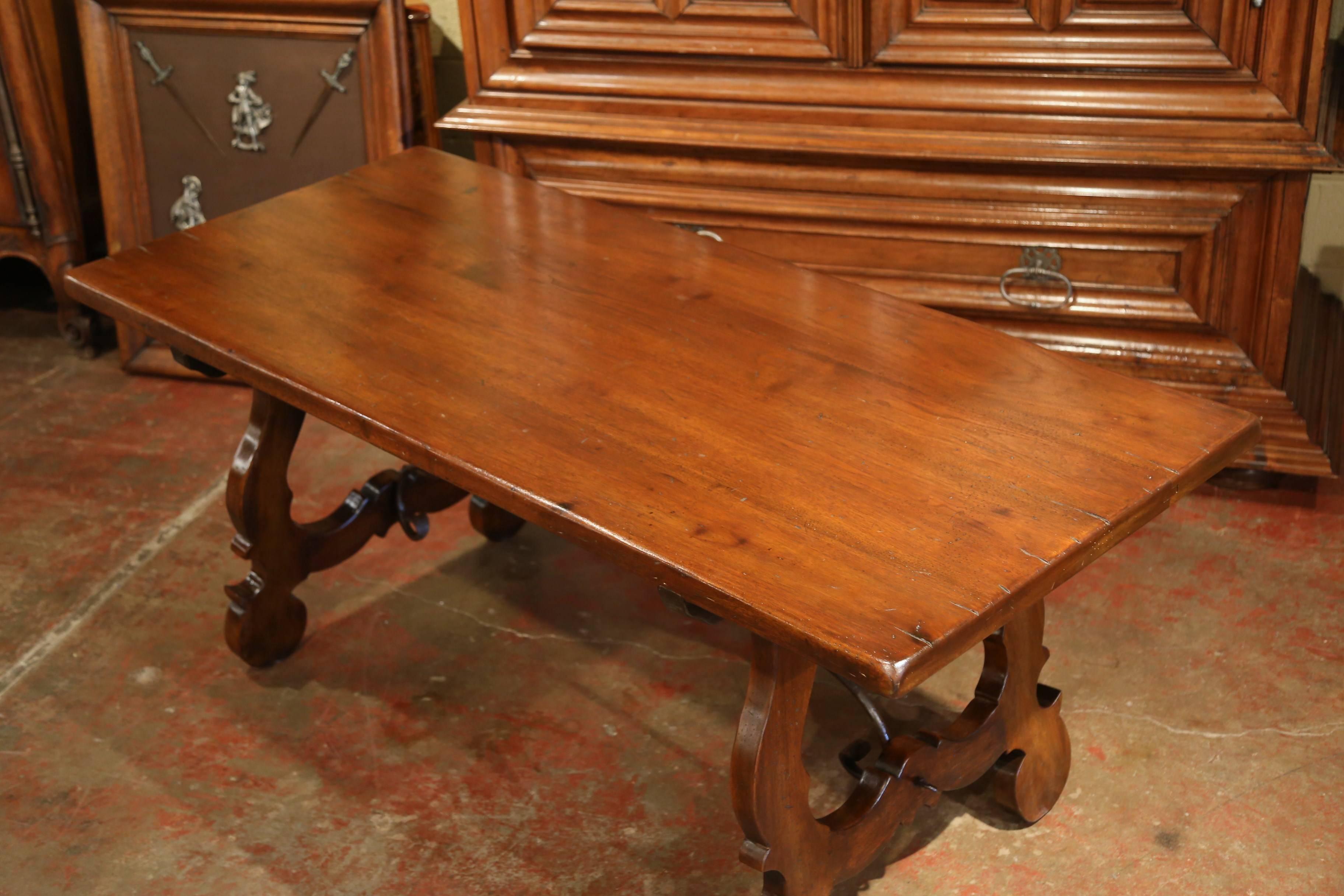 Hand-Carved Early 20th Century Spanish Carved Walnut Trestle Table and Forged Iron Stretcher