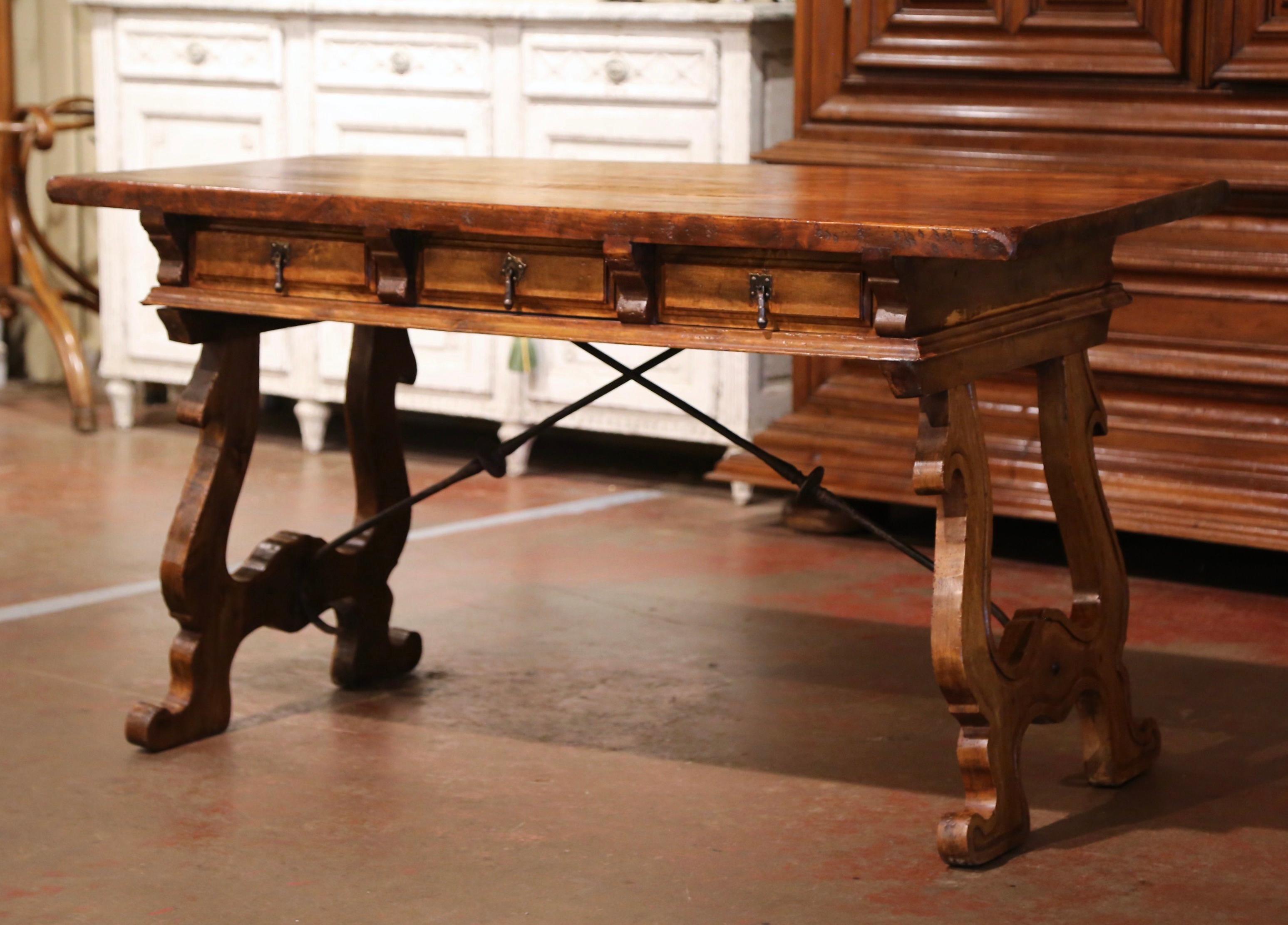 Early 20th Century Spanish Carved Walnut Writing Table Desk with Iron Stretcher In Excellent Condition In Dallas, TX