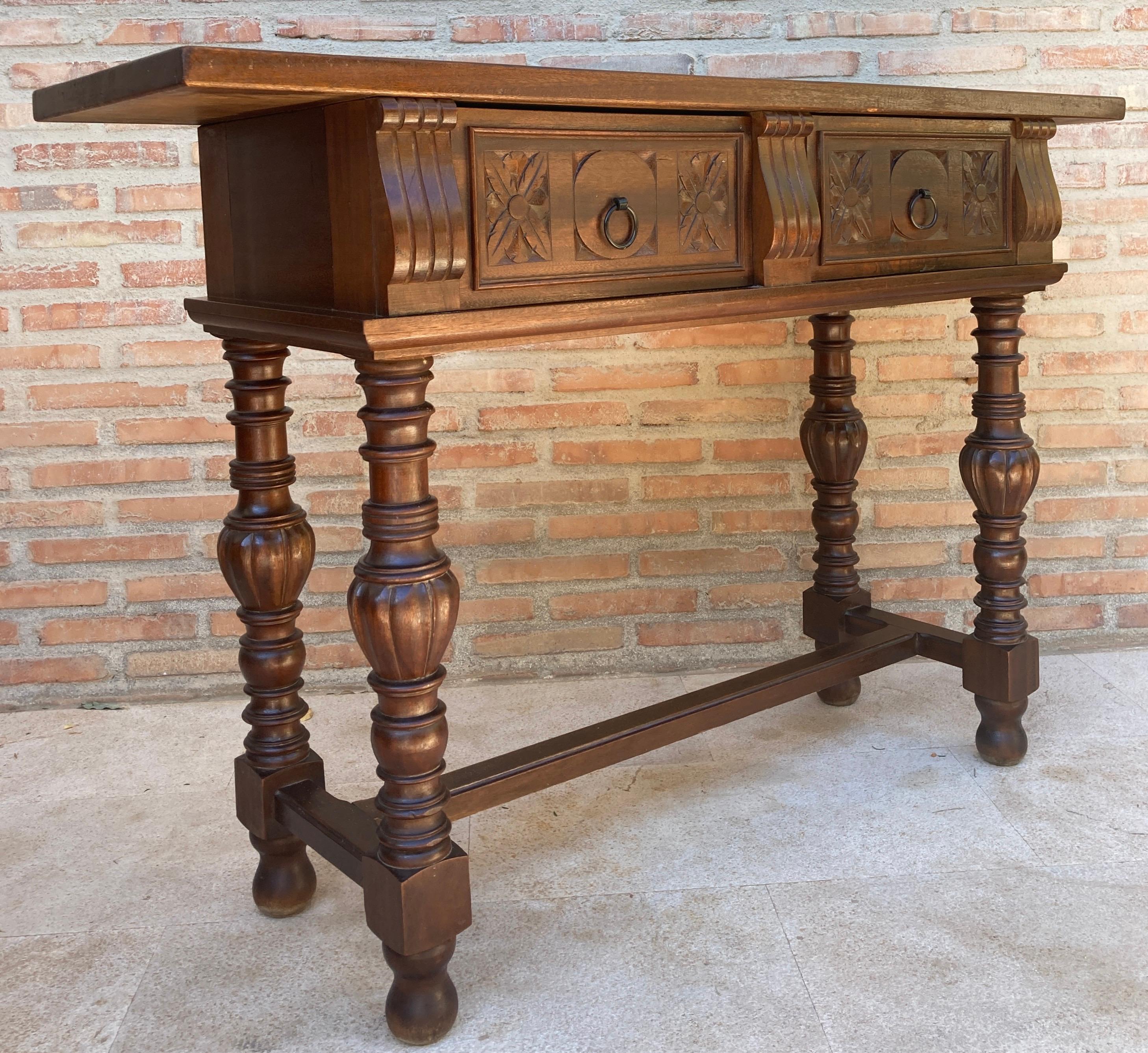 Spanish Colonial Early 20th Century Spanish Console Table with Two Carved Drawers and Turned Legs For Sale