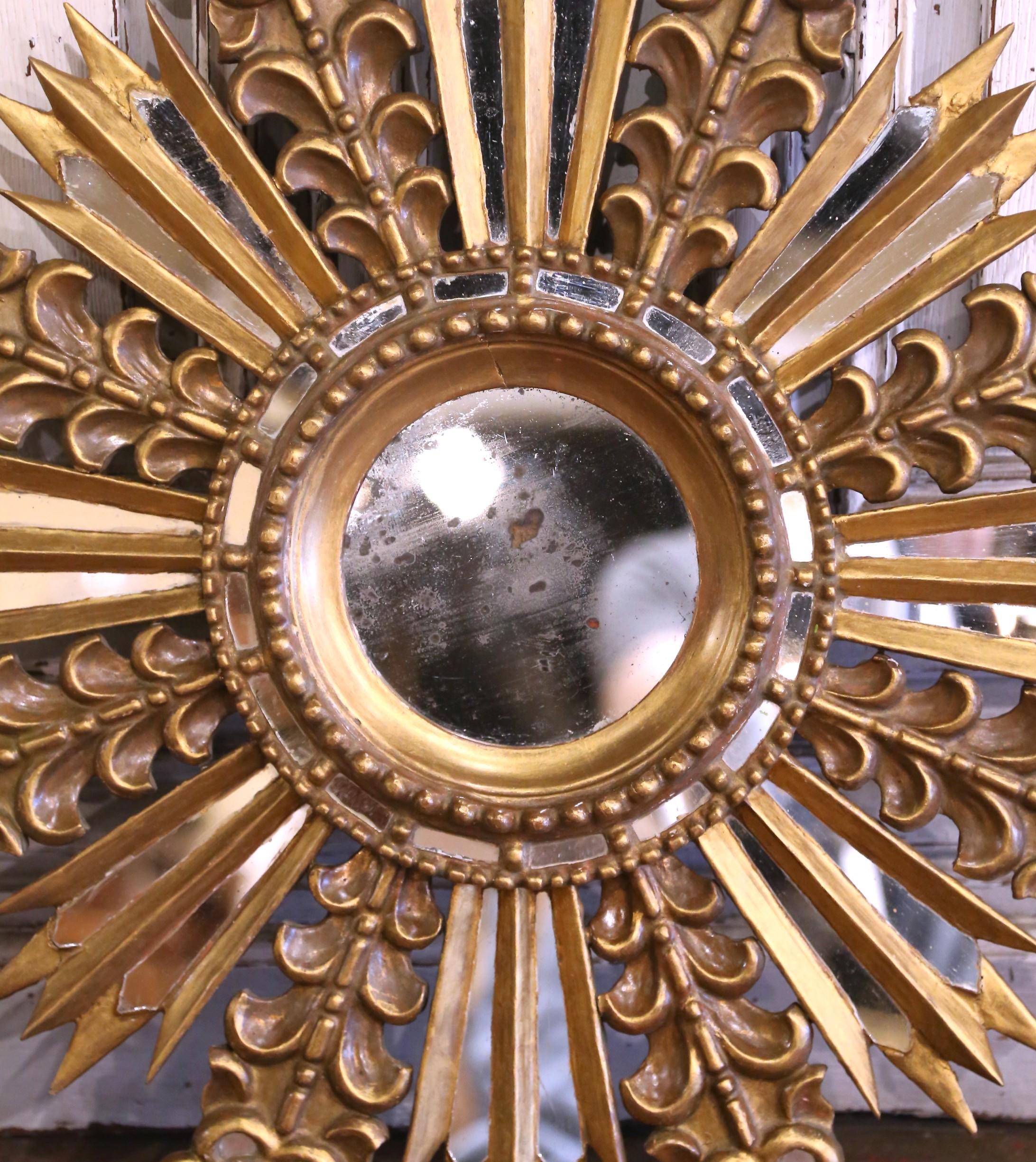 Espagnol Miroir mural Sunburst espagnol du début du 20e siècle en bois doré avec inserts miroirs en vente
