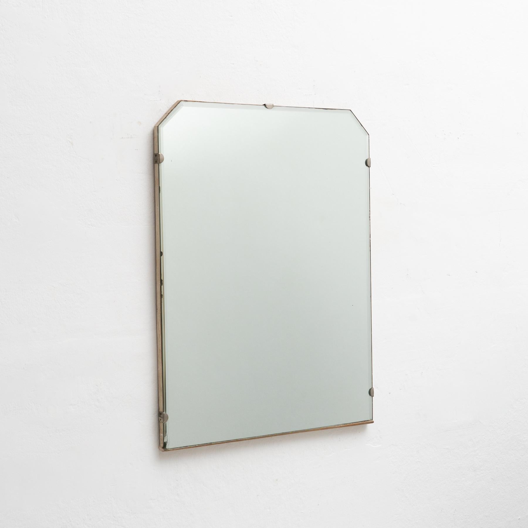 Antique Spanish metal mirror.

Manufactured by unknown designer in Spain, circa 1900

In original condition, with minor wear consistent of age and use, preserving a beautiful patina.

Materials:
Mirror.
Metal.