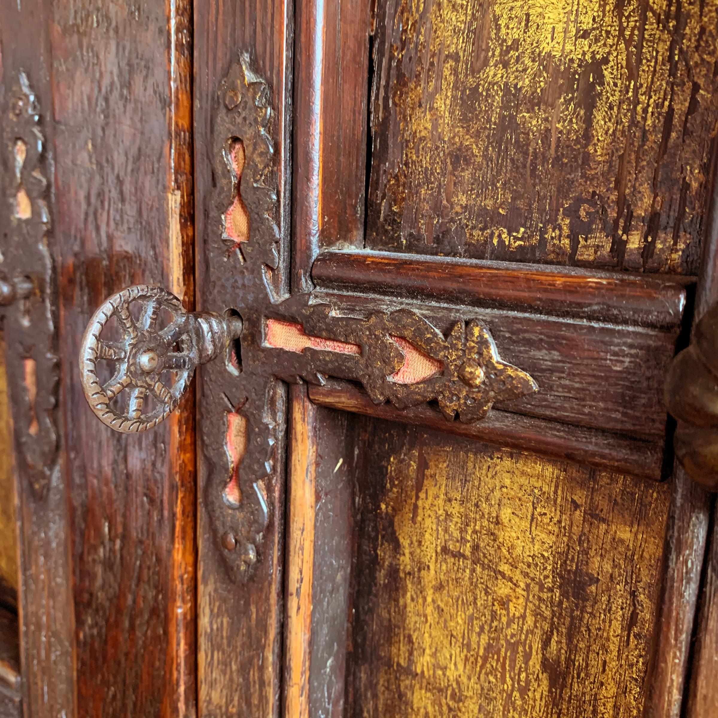 Early 20th Century Tudor Revival Cabinet with Gold Leaf Paneled Doors 3