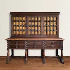 Early 20th Century Tudor Revival Cabinet with Gold Leaf Paneled Doors